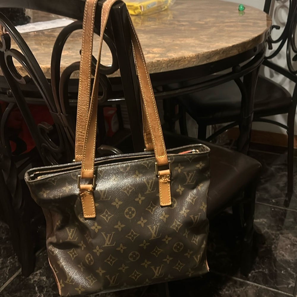 Authentic LV in fair condition, still good use straps need repair